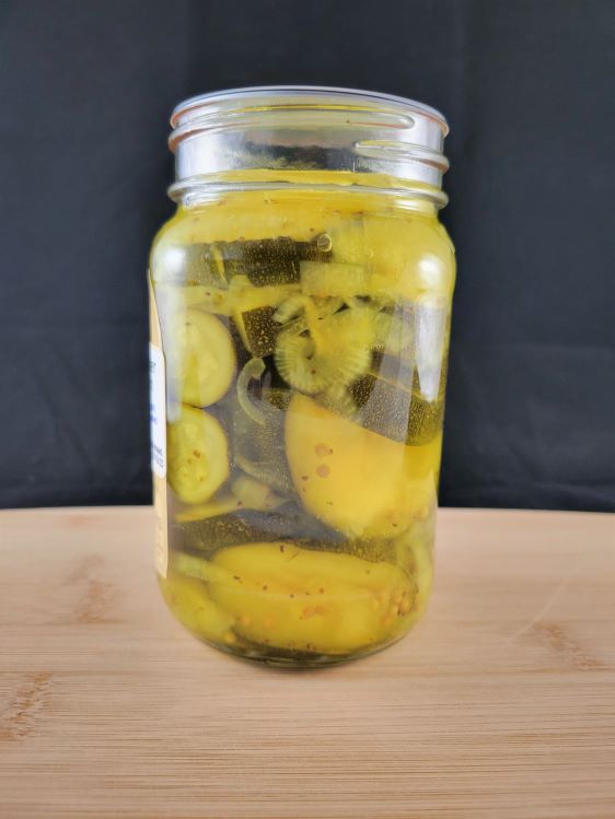 Side view of jar of pickled squash